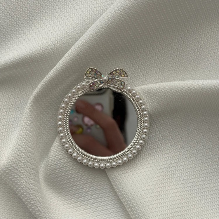آینه چسبی پشت گوشی